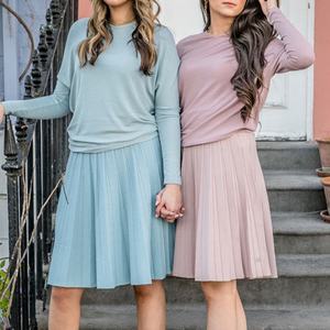 Nouvelle jupe plissée en tricot écologique respirante à taille haute mi-longue en forme de A pour femmes, mode décontractée printemps été, couleur unie - Product Image 1