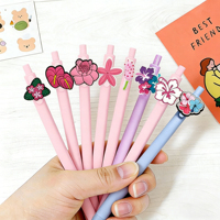 Stylos gel décoratifs en PVC à thème floral mignon, fabrication d'usine, motif fleurs tropicales, stylo gel en PVC respectueux de la peau avec breloque