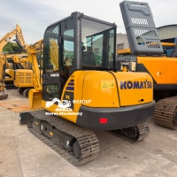 Mini-excavatrice sur chenilles Komatsu PC56 5T d'occasion avec moteur et système hydraulique fiables, idéale pour les travaux de construction et de terrassement