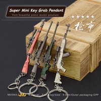 Vente en gros d'armes chaudes Vendre une gamme complète d'armes à feu Modèles d'armes Artisanat en métal Porte-clés Pendentifs Jouets pour enfants