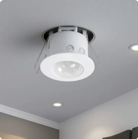 Détecteur de mouvement infrarouge 360° encastré avec temporisation et luminosité réglables, installation encastrée pour usage intérieur