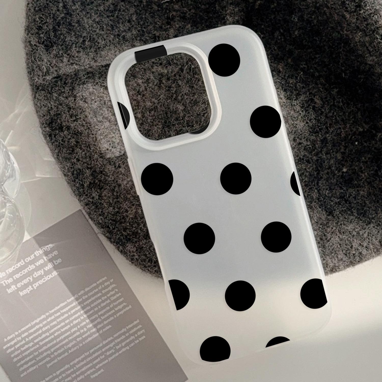 Translucent white with small black polka dots