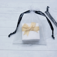 Vente en gros Pochette à bijoux de luxe en organza avec cordon de serrage Cadeau de Noël Sac cadeau d'anniversaire Pochette d'emballage en organza