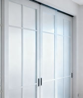 Portes coulissantes encastrées en aluminium à rupture de pont thermique, antivol et résistantes aux intempéries, de conception française Beigeman, pour l'extérieur des appartements et les chambres à coucher