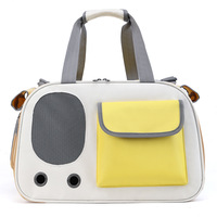 Nouvel arrivage de sac de voyage pour animaux de compagnie en maille respirante avec trous dans la pochette avant pour les transporteurs de chats et les transporteurs d'animaux de compagnie