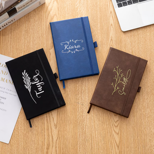 Carnets personnalisés A5 en cuir végétalien PU, couverture rigide, pages vierges, gravure laser, avec bande élastique et porte-stylo - Product Image 1