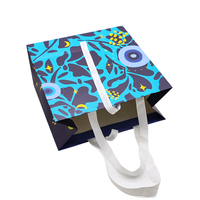 Sacs en papier pour emballage cadeau de marque personnalisée sacs en papier artisanaux blancs sacs en papier à provisions en papier avec logo et poignée en ruban