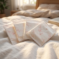 Vente en gros de serviettes hygiéniques ultra-fines jetables en coton biologique avec ailettes et protection anti-fuites Softcare Anion pour femmes Fujian Chine