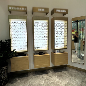 Tùy chỉnh hiện đại LED chiếu sáng vòng treo tường Kính mát hiển thị kệ kính hiển thị cho cửa hàng quang học - Product Image 1