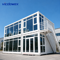 VICDOWEX Maison conteneur préfabriquée modulaire à deux étages, design Asie du Sud-Est, avec murs en panneaux sandwich pour entrepôt