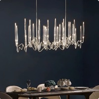 Lustre moderne de luxe personnalisé en acier inoxydable doré avec cristaux, luminaire suspendu linéaire ondulé pour projet hôtelier, salle à manger, villa