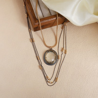 Collier rétro multicouche YEHHY pour femme, pendentif ovale, perles en résine, chaîne de pull, accessoire décoratif haut de gamme de luxe léger