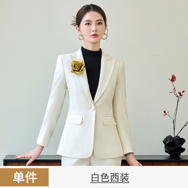 White suit corsage
