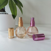 Bouteilles de pulvérisation cosmétiques 10 ml flacon pulvérisateur en verre rond en forme d'ampoule bouteille en verre coloré avec pulvérisateur à brume fine