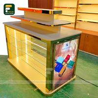 Parfumerie de luxe Design d'intérieur personnalisé or vitrine comptoir de vente au détail parfum magasin luminaire moderne vitrine