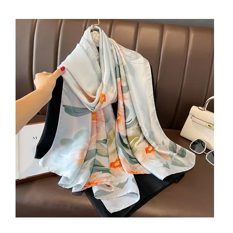 Vente en gros d'écharpe imprimée en soie lisse élégante et légère grande écharpe douce à fleurs en imitation soie châles pour robe de soirée