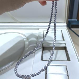 Collier en or 18 carats avec perle d'eau douce réglable de 7 à 10 mm, design étoilé et boule naturelle au centre - Product Image 1