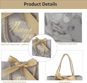 <span class=keywords><strong>Sac</strong></span> en papier <span class=keywords><strong>de</strong></span> <span class=keywords><strong>luxe</strong></span> personnalisé et recyclable avec poignée longue et nœud pour Noël et le <span class=keywords><strong>Black</strong></span> <span class=keywords><strong>Friday</strong></span> – Vente en gros - Product Image 3