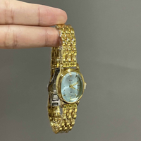 Montre à quartz ovale vintage pour femme, cadran coquille, bracelet en alliage métallique doré, élégante montre-bracelet pour femme, idéale pour un cadeau quotidien