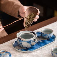 Ensemble de tasses à thé en céramique bleue et blanche à motif de pivoine, patrimoine immatériel chinois, avec coffret cadeau de luxe pour les fêtes et les cadeaux d'affaires