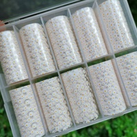 Qianya nouvelle arrivée en gros fleur papillon brillant ongles transfert feuille léopard ongles décalcomanies saint valentin ongle autocollant