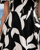 Robe midi décontractée à volants et épaules dénudées à motif floral personnalisé pour femme – Vente en gros
