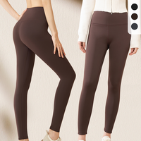Pantalones de yoga ajustados para correr con patrón sólido de compresión de cintura alta con bolsillos a rayas, pantalones cortos de yoga abdominales y levantamiento de cadera