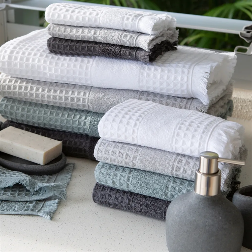 थोक उच्च गुणवत्ता के नए डिजाइन के साथ स्नान हाथ तौलिए 100% कपास लिनन वफ़ल तौलिया Tassels