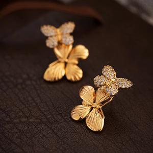 Alta calidad mujeres hermosa joyería de moda de lujo dorado niñas circón mariposa ala Stud pendientes - Product Image 4