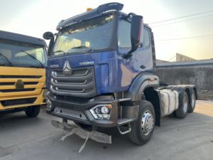 รถบรรทุกหัวลากมือสอง Sinotruk Howo NX 6x4 แบบหลังคาเรียบ พวงมาลัยซ้าย เครื่องยนต์ดีเซลยูโร 2 กำลัง 351-450 แรงม้า รับน้ำหนัก 31-40 ตัน เครื่องยนต์ Weichai สำหรับงานหนัก - Product Image 2