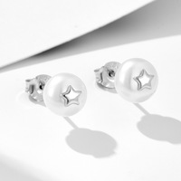 Boucles d'oreilles polyvalentes en argent sterling S925 de luxe léger rétro français chapeau de fleur en forme d'étoile à cinq branches perle naturelle