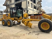 Niveleuse à moteur Cat 140K d'occasion avec lame de 12 pieds et transmission à 8 vitesses Power Shift