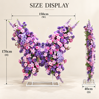 Rangka Bunga Kupu-kupu Kustom, Dekorasi Bunga PU Mawar dan Hydrangea Campuran dengan Stand Logam, Latar Belakang Photo Booth Pernikahan