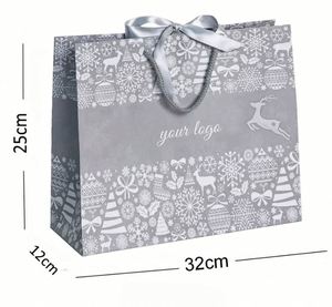 ถุงกระดาษช้อปปิ้งพิมพ์ลายตามสั่ง ทนทาน ใช้ซ้ำได้ สำหรับบรรจุภัณฑ์เสื้อผ้าและเครื่องประดับหรูหรา พร้อมหูหิ้ว เหมาะสำหรับเป็นถุงของขวัญทางธุรกิจ - Product Image 1