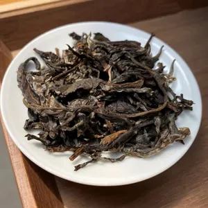 Hot Selling Chinese Tea Wholesale Cheap Price Good Quality Chinese Puer Tea Bag Raw Puer Tea Yunnan Puer Qizi Cake 200g