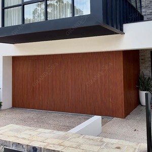 Grandsea Ligne affleurante <span class=keywords><strong>de</strong></span> conception moderne aspect bois Batten Tilt Up <span class=keywords><strong>Porte</strong></span> <span class=keywords><strong>de</strong></span> <span class=keywords><strong>garage</strong></span> pour villa Portes <span class=keywords><strong>de</strong></span> <span class=keywords><strong>garage</strong></span> encastrées et cachées - Product Image 1