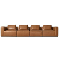 Canapé modulaire en cuir de haute qualité avec assise cascade et coussins rembourrés, idéal pour hôtel et salon