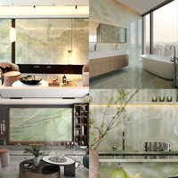 Dalle de marbre vert onyx pierre naturelle translucide de luxe personnalisée pour îlot de cuisine comptoir de salle de bain vanité panneau mural rétro-éclairé