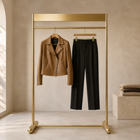 Porte-vêtements en métal doré, sur pied, pour boutique de vêtements, fabrication sur mesure pour magasins de détail