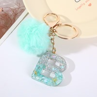 Porte-clés personnalisé en résine avec 26 lettres, pendentif boule pelucheuse verte, mousqueton, cadeau pour femme, ornement de sac à main, vente en gros