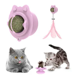 Venta al por mayor de juguetes multifuncionales giratorios molares Limpieza de dientes interactivo Lick Cat Ball para gato Catnip Ball Cat Mint Ball