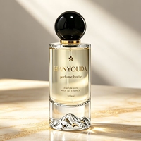 Flacon de parfum en verre de luxe avec capuchon sphérique magnétique 30ml 50ml 100ml, base montagne, logo personnalisé, vide, rechargeable, avec pulvérisateur à pompe