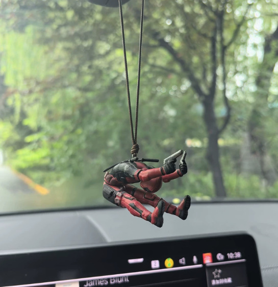 Bent over and shoot deadpool car hanging