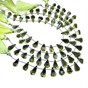 Cuentas de cuarzo limón natural facetadas en forma de lágrima de 6x10mm a 9x15mm, vendidas por hebra de 8 pulgadas de largo. - Product Image 1