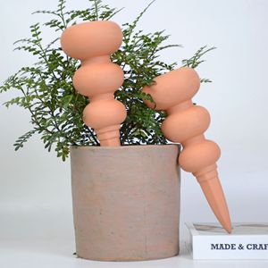 Dispositif d'arrosage automatique <span class=keywords><strong>en</strong></span> céramique à pointes <span class=keywords><strong>en</strong></span> argile <span class=keywords><strong>terre</strong></span> <span class=keywords><strong>cuite</strong></span> pour gourde conçu sur mesure pour les plantes <span class=keywords><strong>en</strong></span> pot de bureau - Product Image 2