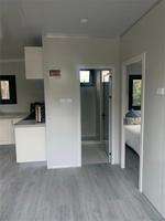 Maison Modulaire Préfabriquée Zéro Entretien, Résistante à l'Air Salin, 3 Chambres, avec Électricité SAA pour Investissement en Station Balnéaire