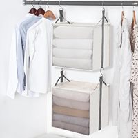 Panier de rangement suspendu double couche avec crochets, idéal pour les dortoirs, appartements, chambres, portants à vêtements et armoires.