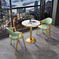 Ensemble table et chaises de négociation compactes de luxe nordique pour bureaux de vente modernes, salons de thé, maisons et tables à manger simples