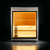 Sauna |   Cabane de luxe moderne minimaliste panoramique en bois gris avec cadre noir pour l'extérieur