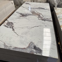 Vente en gros Feuille de marbre PVC Panneau de revêtement mural décoratif intérieur 2.5*1220*2440 Feuille de plastique en pierre de faux marbre
